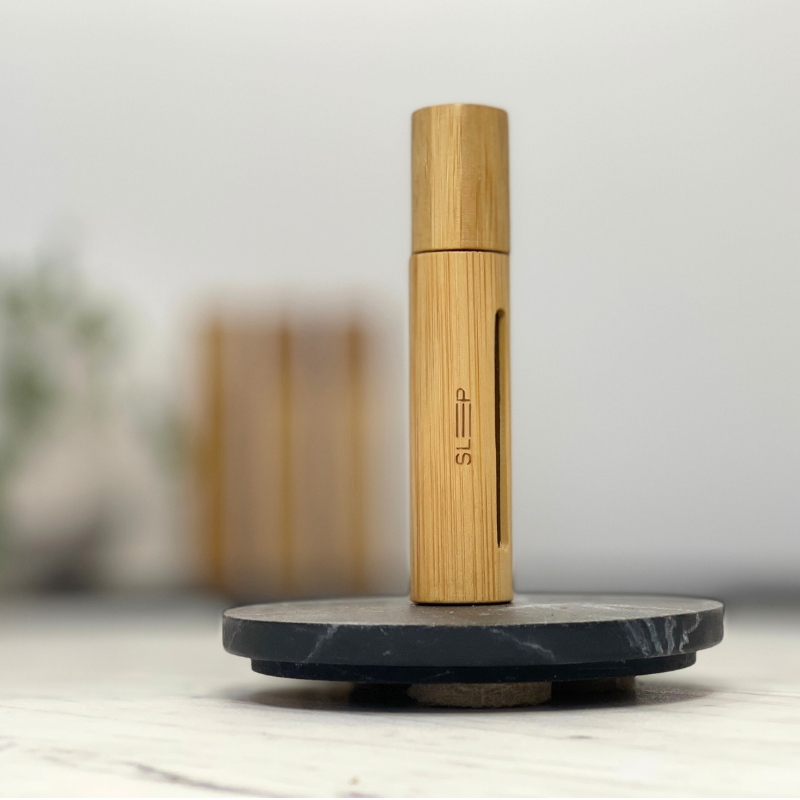 Essential oil roller, Sleep Blend, in a sleek bamboo case with sealed cap