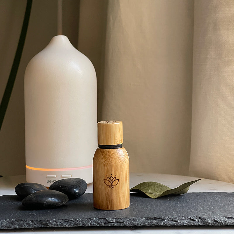 Slumber Gift Set with Herbal sleep tea, relaxing bath soak, 4 signature essential oil blends and an essential oil roller on a marble base