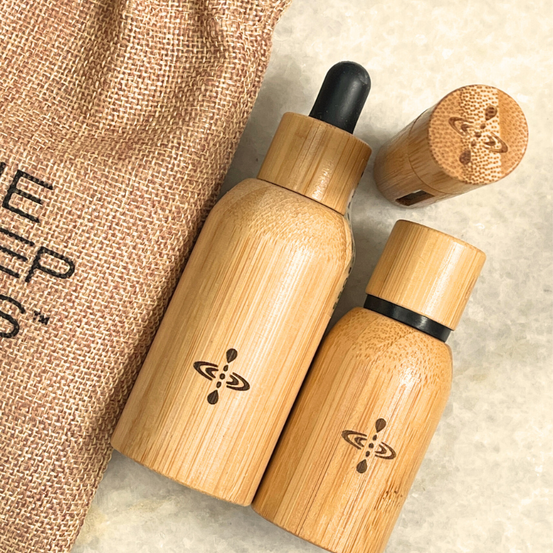 Mindfulness Luxury Oil ritual set on a marble table with carry pouch