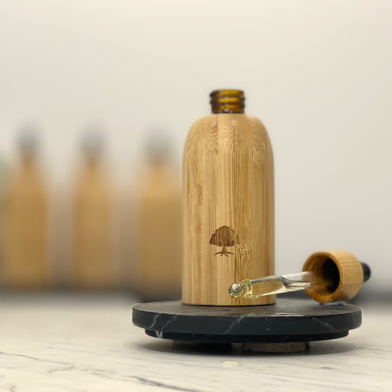 Resilience Luxury Serum in bespoke bamboo bottle with dropper