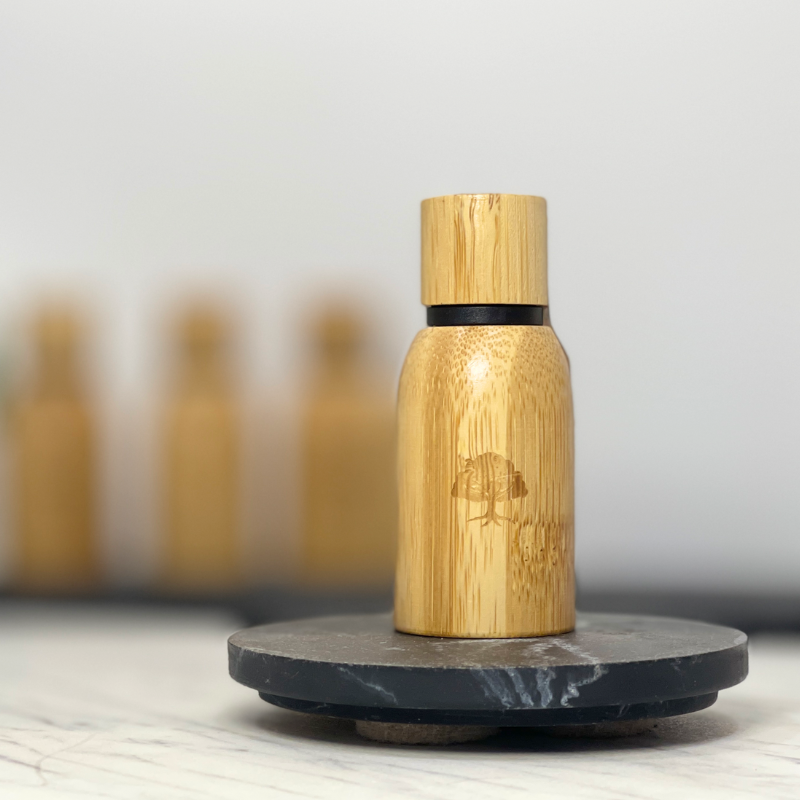 15ml Resilience Blend Pure Essential Oil encased in bamboo reflecting eco-friendly elegance.