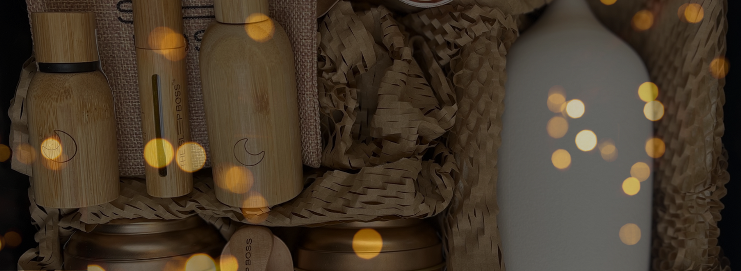 bamboo essential oil rollers and white ceramic diffuser in a gift box